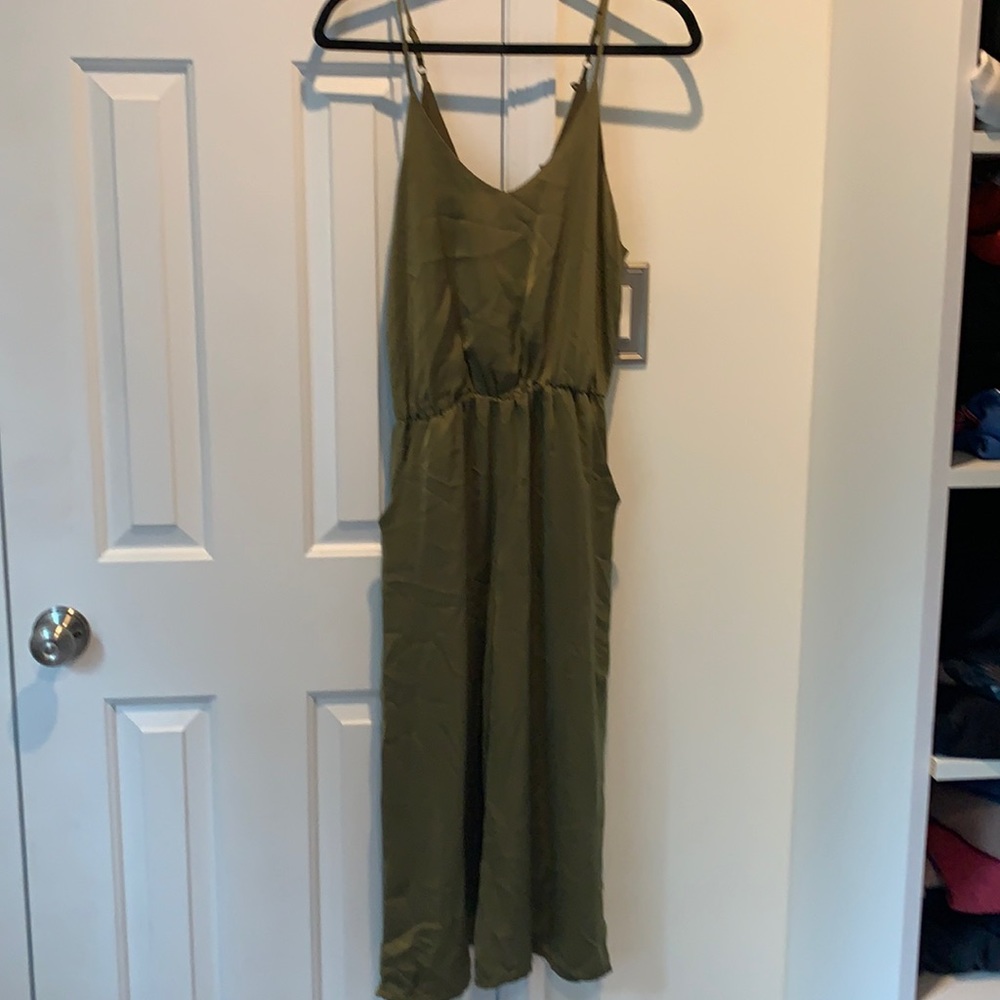Green satin jumpsuit with pockets size small